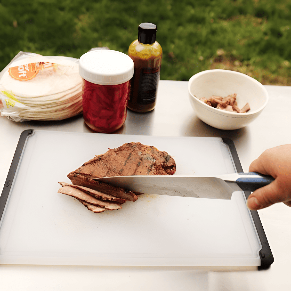non-slip plastic cutting board with grippy edges