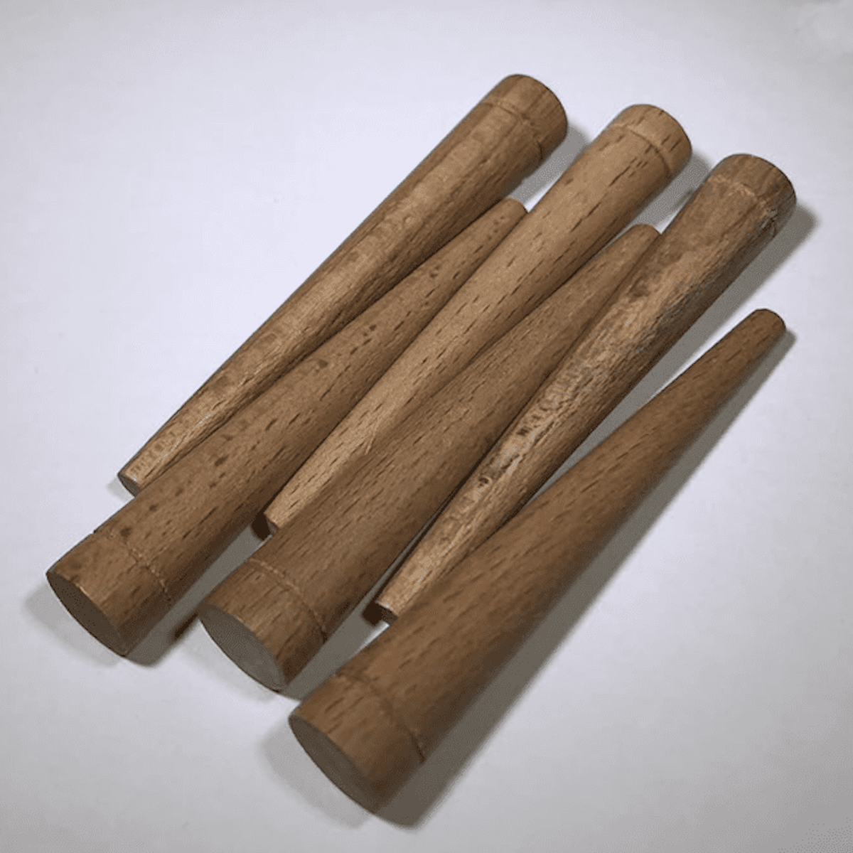 Tapered cherry wood pegs