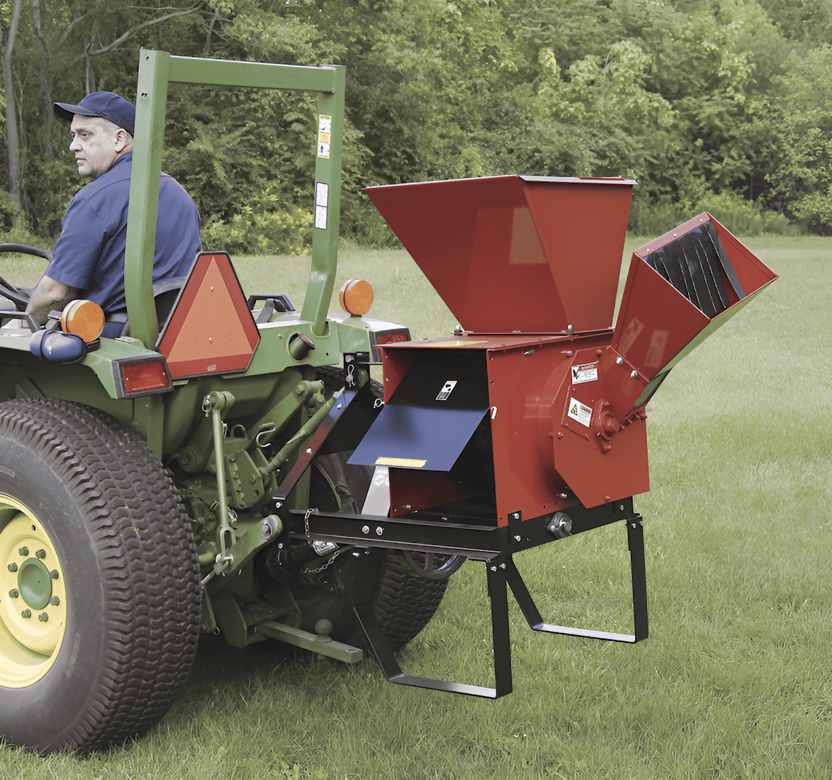 PTO-driven wood chipper turning sawmill offcuts into wood chips