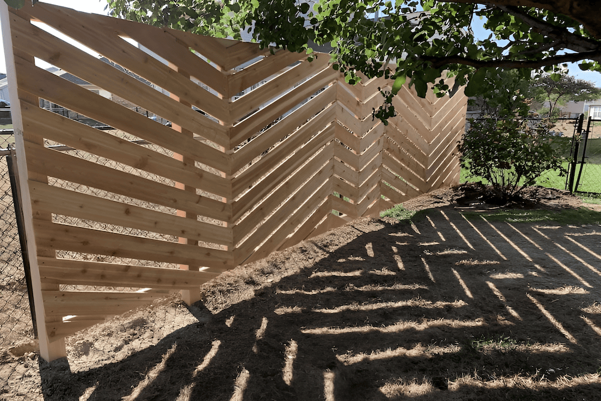 backyard herringbone wood lattice privacy wall