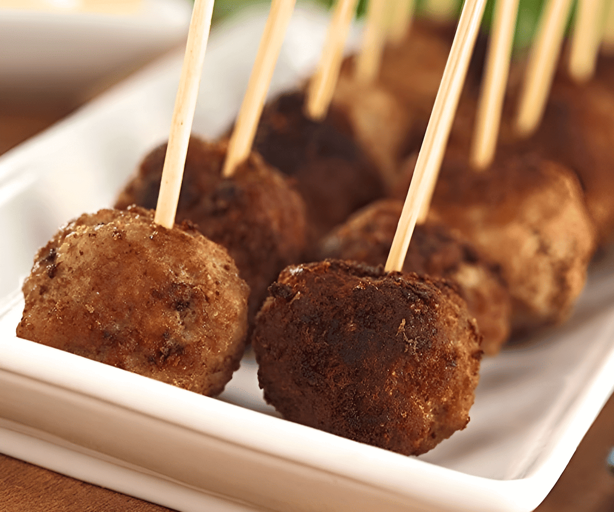 Plain wood toothpicks holding meat and appetizers together