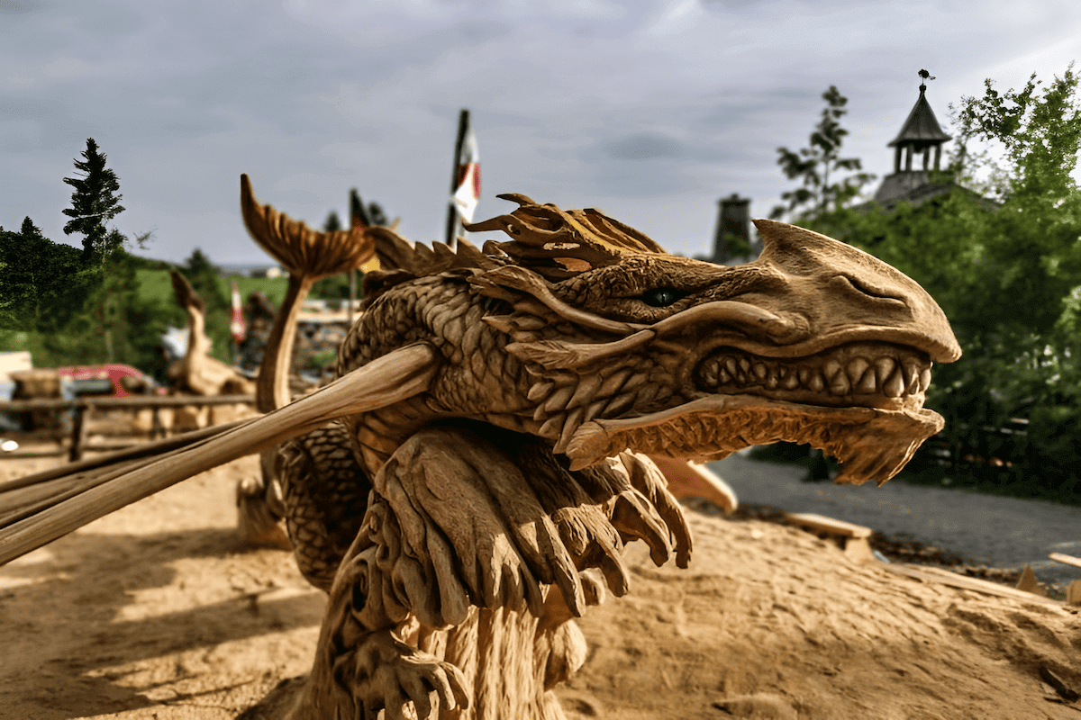 A mythical creature chainsawed from a single block of wood