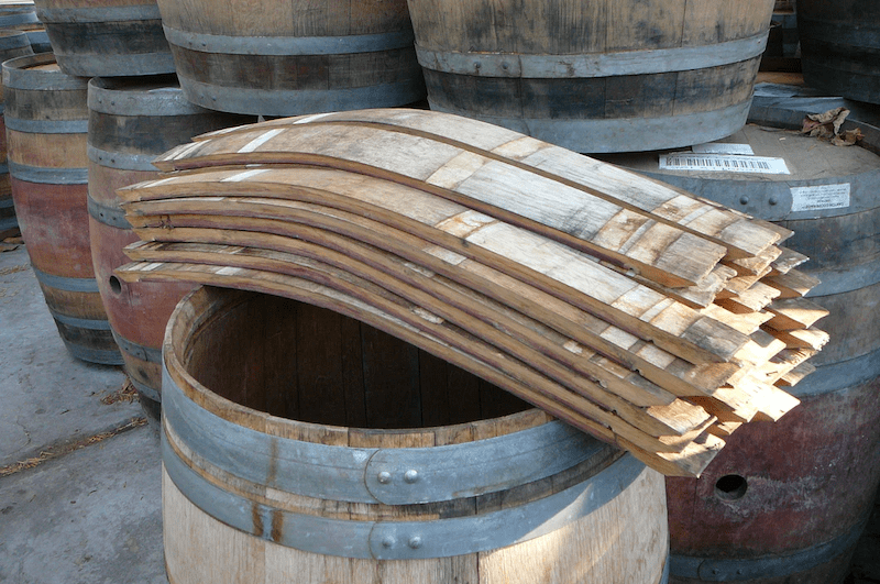 the staves of an oak barrel ready for assembly
