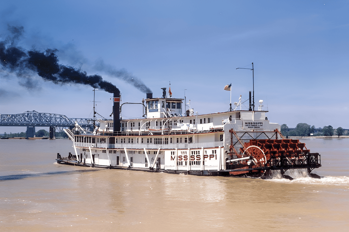 wood paddle wheel used to steer and power a riverboat