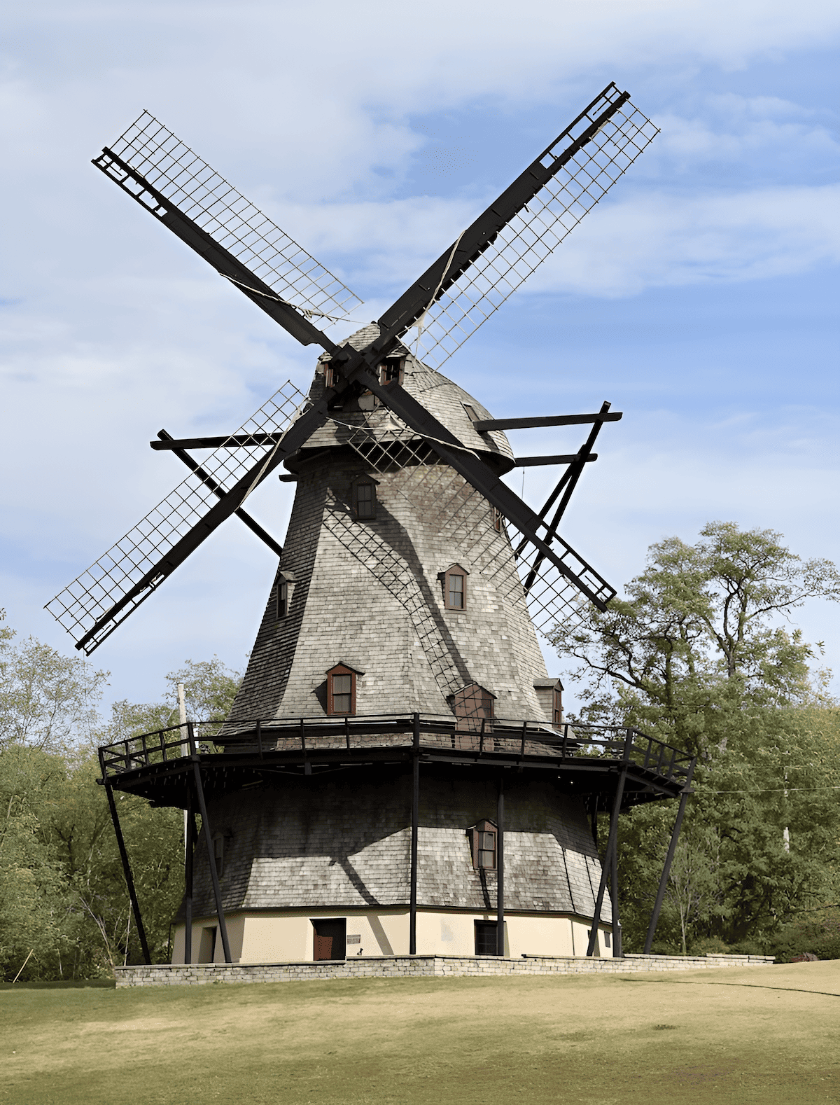 traditional old world smock wood windmill