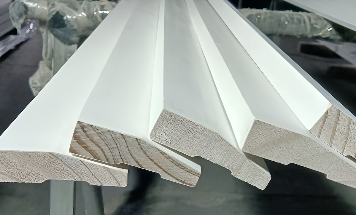 white wood molding and trim brightening a living room