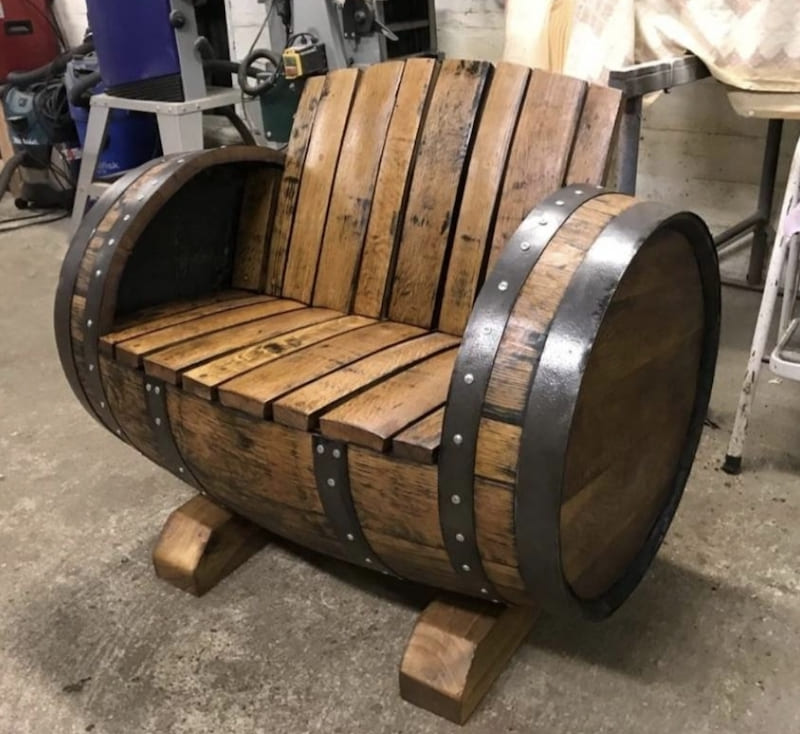 repurposed wine barrel turned into outdoor furniture and garden planters