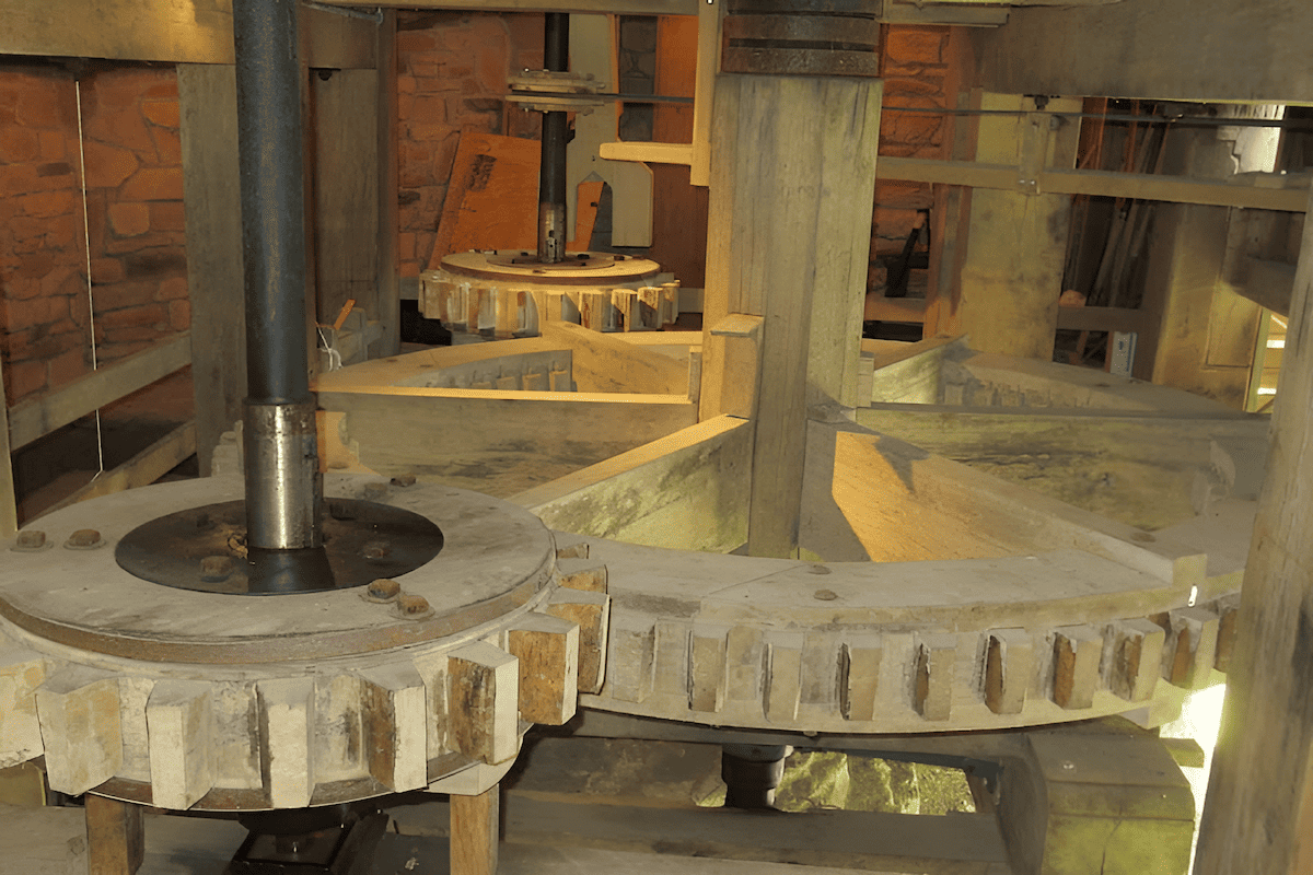 wooden gears inside an old European wooden windmill